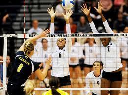 If your blocking the other teams hitter, can your hand touch the net?
