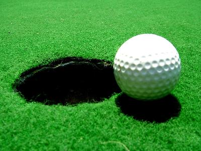 In a complete game of golf, what is the minimum number of holes the players play?