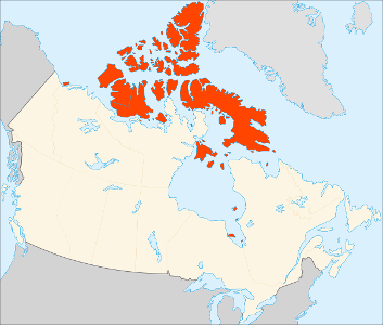 What is a large, flat, treeless area of land found in the Arctic and subarctic regions called?