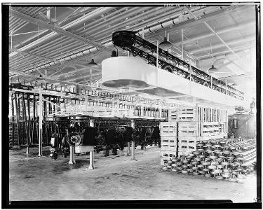 Which industry saw the introduction of assembly line production during the Industrial Revolution?