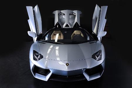 Which luxury car brand produces the Huracan and Aventador models?