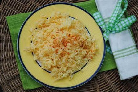 What is the popular Spanish dish of saffron-infused rice with various meats and seafood?