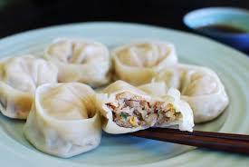 "Mandu are dumplings in Korean cuisine. Mandu can be steamed, boiled, pan-fried, or deep-fried. The styles also vary across regions in Korean Peninsula." Wikipedia.