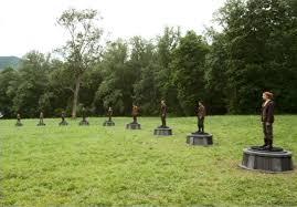 You're in the arena. There is 4 seconds on the clock. The Cornucopia is in the center and trees surveying to the left of you. The right is just wheat. What do you do?