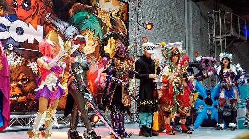 Which comic convention is known for its emphasis on anime and manga?