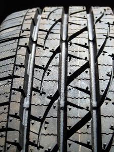 What is the recommended tire tread depth for truck tires?