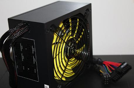 What is the function of a power supply's fan?