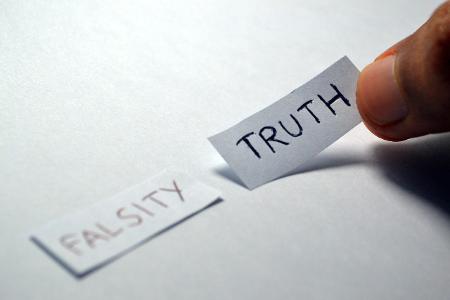 What is the truth value of 'NOT true'?