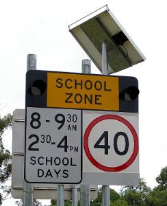 When approaching a school zone during school hours, what is the maximum speed limit?