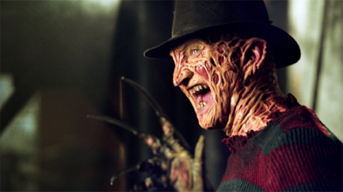 In the film Nightmare on Elm Street, what crime was Freddy Krueger convicted of before he was murdered?
