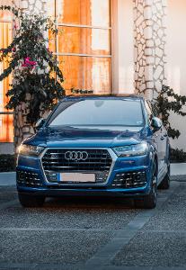 Which luxury car brand is known for its stylish and sporty models like the A5 and Q7?