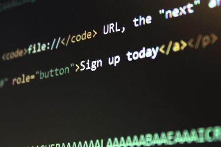 Which programming language is often used for system-level programming?