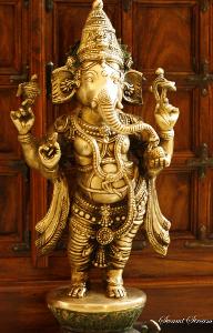 Which sacred animal is associated with Lord Ganesha?