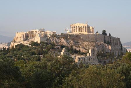 Which city is known for its cultural landscape featuring the ancient Acropolis?