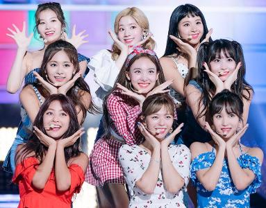 In what year did TWICE release their first song?
