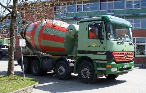 Which truck is designed for mixing and transporting concrete?