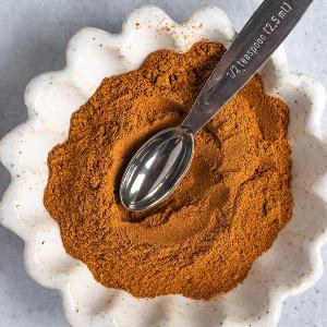 Which spice is often added to pumpkin smoothies?