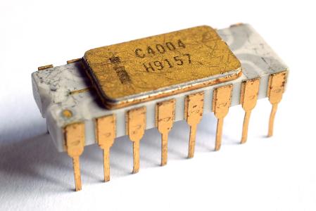 Which company developed the first commercial microprocessor?