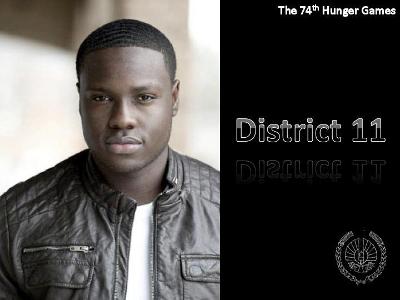 During the victory tour, in district 11, their and two people on the stand of Thresh's family. Who are these people?
