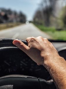 What is the correct hand position on the steering wheel?