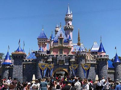 Which company is known for creating the popular theme park Disneyland?