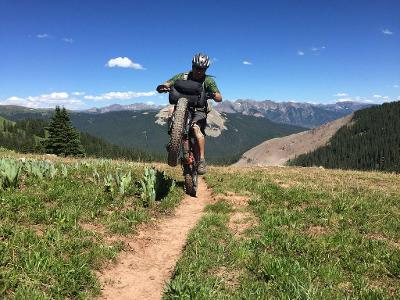 Which US state offers some of the best mountain biking trails in the world?
