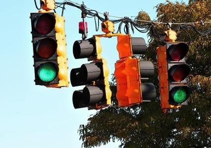 Which driving environment is more likely to have traffic lights?