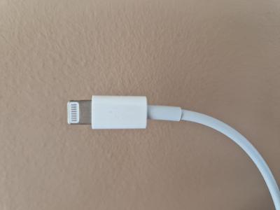 Which Apple Inc. product introduced the Lightning connector?