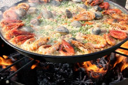 Which country is famous for its traditional dish 'Paella'?