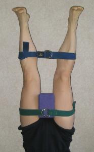 What is the purpose of a yoga prop such as a block or strap?