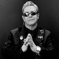 What music genres does Elton John cover?