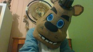 when bored sitting in a owl onesie and have a hand made freddy head.