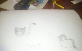 It's hard to tell but it's Karkat, as a literal cat XD