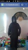 Its a old pic of me dressed like a grim reaper and clown mask from slipknot