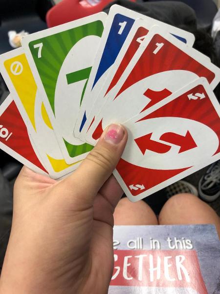 Playing Uno with five of my classmates