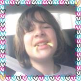 Me being silly with French fries in the back of the car. xD