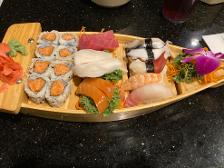 Sushi and sashimi boat coming through!