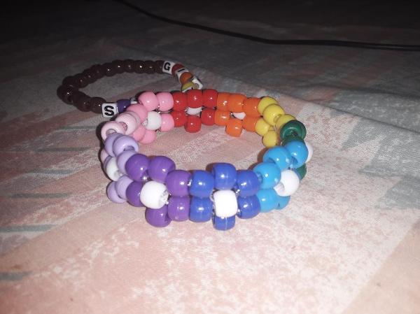 i made a rainbow flower kandi cuff!! <3 it's ugly but i love it :D