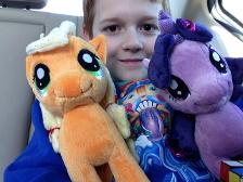 Me with my new pony friends with Rubik's Cube in corner
