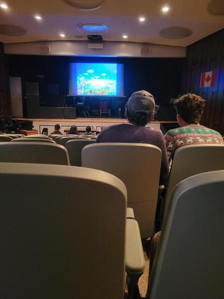 Don't mind us- just watching people play video games in a fine arts theatre