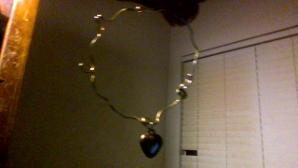 my attempts to make jewelry out of a fence and charm that my mother wont buy me