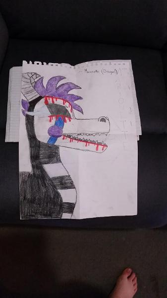 Found this pic of marionette from fnaf as a dragon. When i drew it.